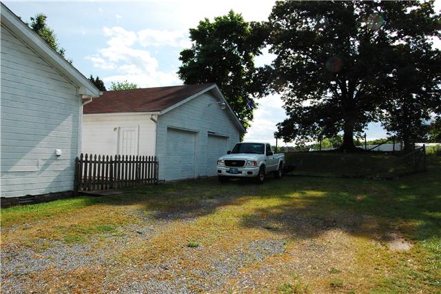 2231 Stokes Road Clarksville, TN 37043 - Photo 16 of 16 The Detached 2 car Garage has access from both inside the Fence and out with a separate Door leading to the House