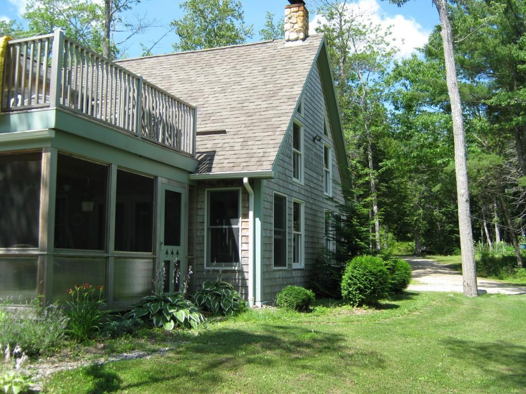 233 Gus Moore Road Penobscot, ME 04476 - Photo 4 of 35 Screened in porch with master...