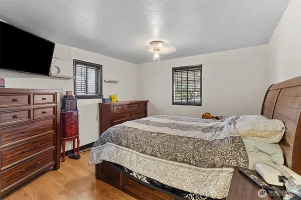 a shelf with books and knick knacks on it