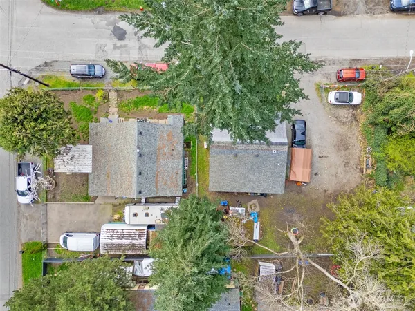 an aerial view of a house with outdoor space