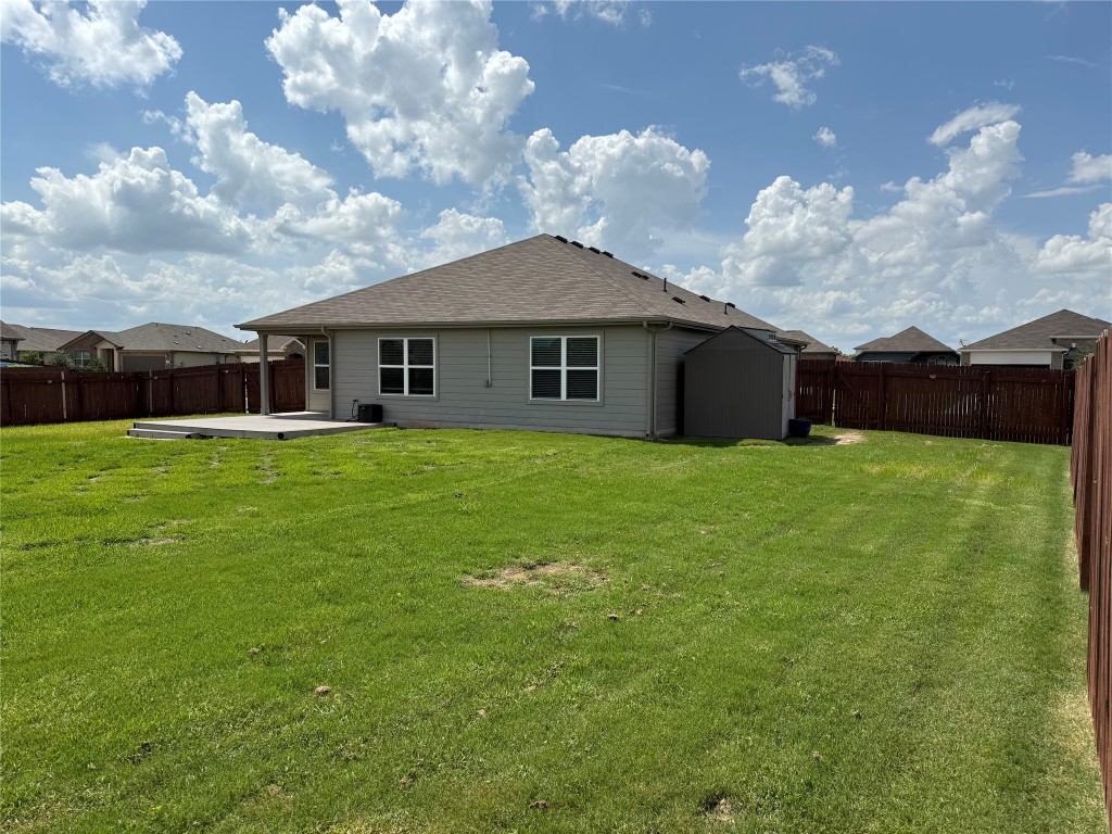 300 Colthorpe Lane Hutto, TX 78634 - Photo 2 of 36 a view of a house with a yard and large trees