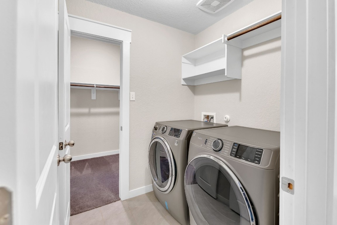 300 Colthorpe Lane Hutto, TX 78634 - Photo 29 of 36 a utility room with dryer and washer