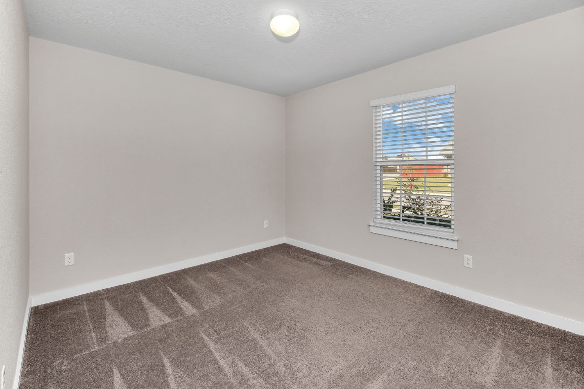 300 Colthorpe Lane Hutto, TX 78634 - Photo 30 of 36 an empty room with a window