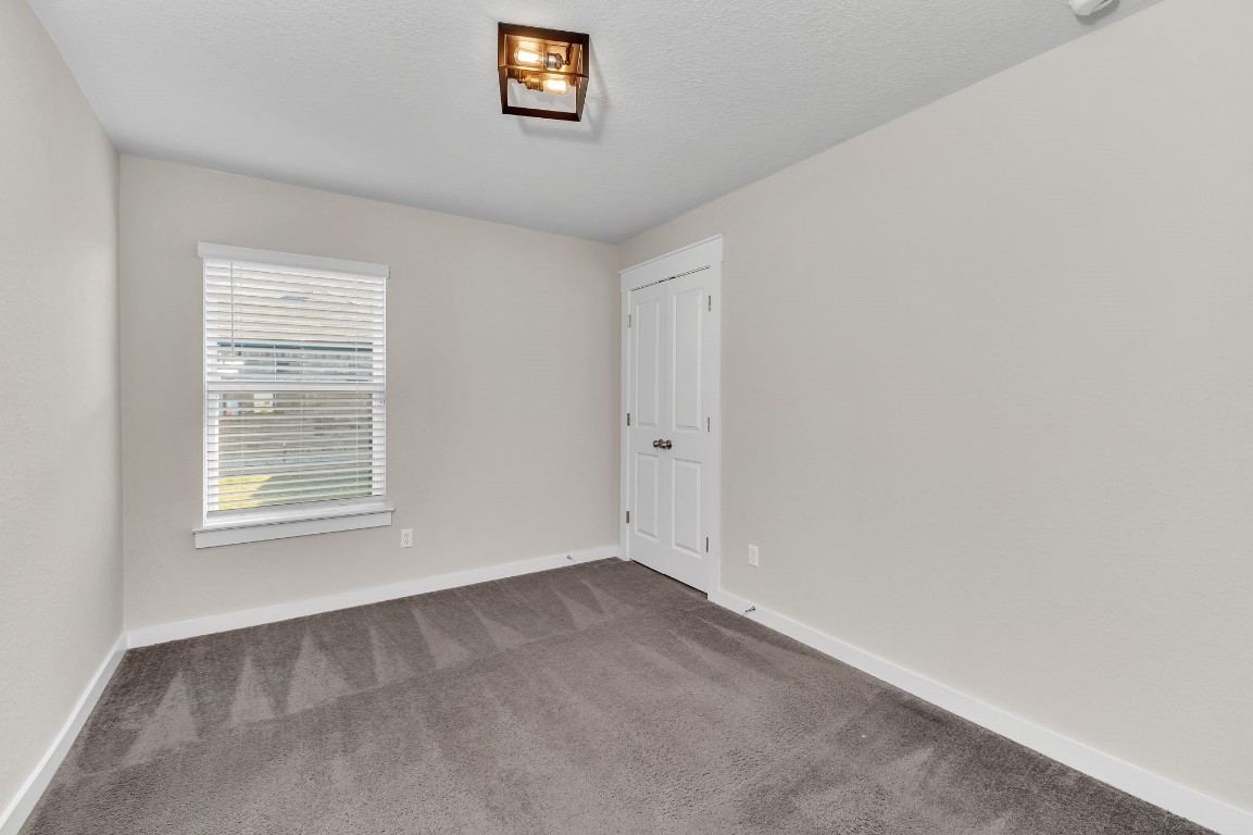 300 Colthorpe Lane Hutto, TX 78634 - Photo 33 of 36 an empty room with a window