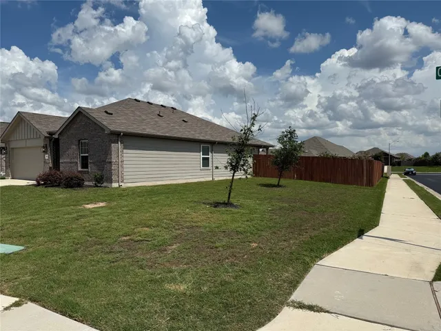 a view of a garden with a small yard