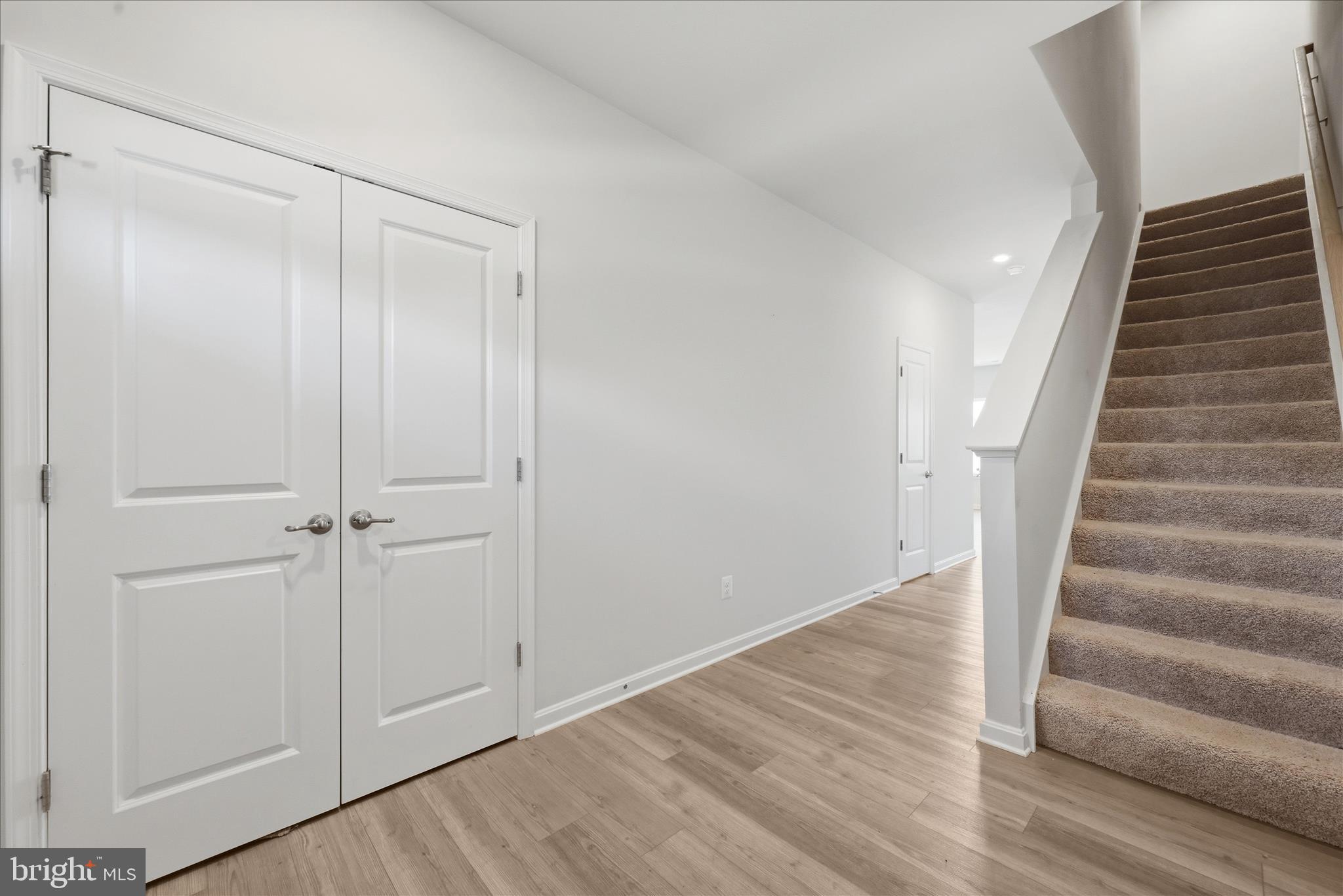 73 Hopkins Street Ranson, WV 25438 - Photo 13 of 32 a view of an entryway with staircase
