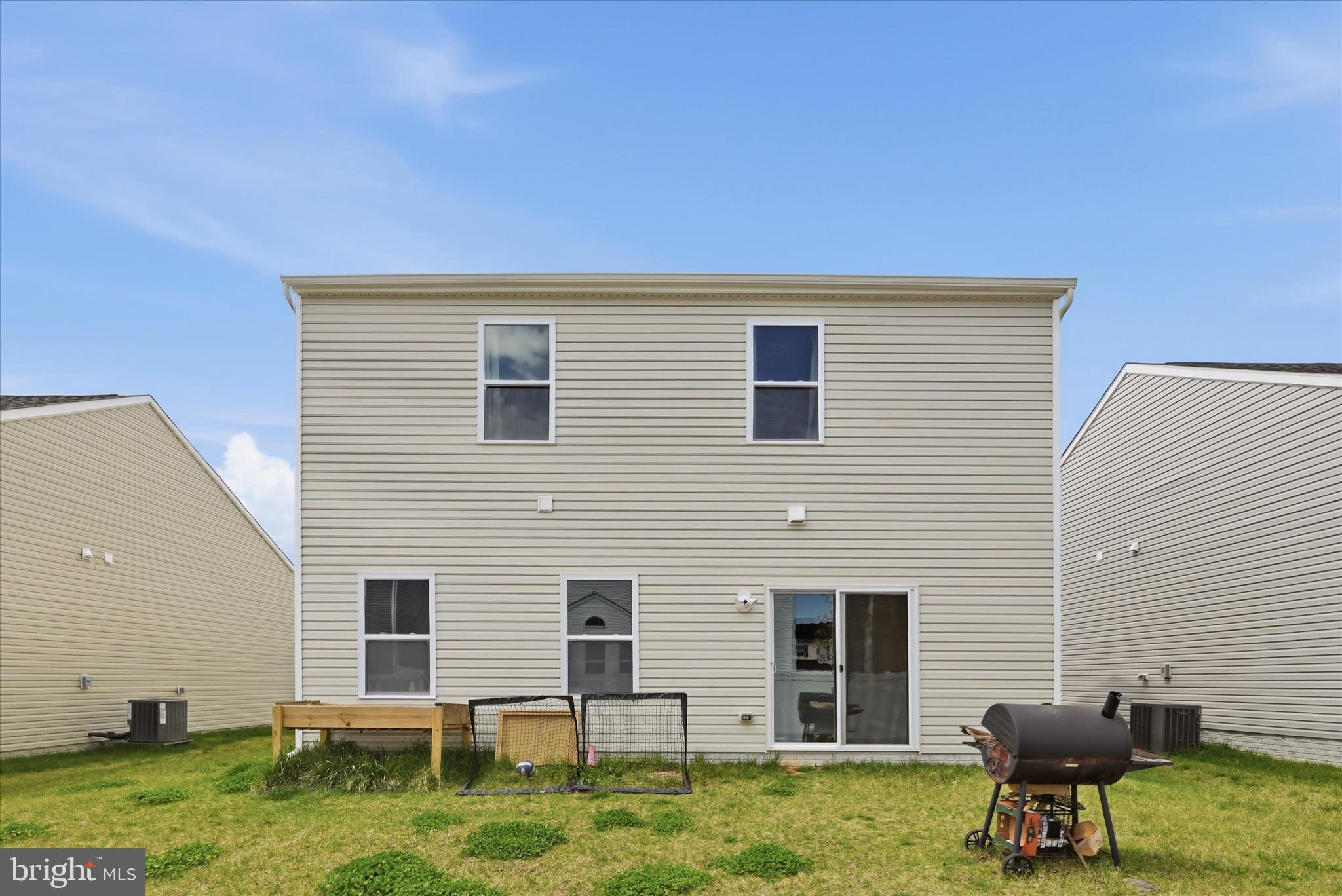 73 Hopkins Street Ranson, WV 25438 - Photo 25 of 32 a backyard of a house with seating space