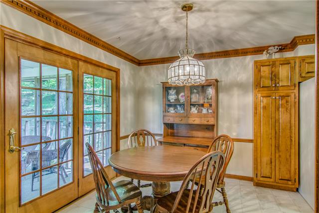 207 Stoneybrook Road Columbia, TN 38401 - Photo 10 of 20 Nook off Kitchen...Double doors lead to the screened in porch...