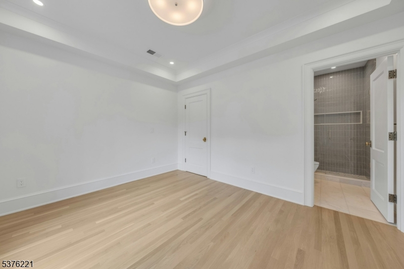 82 Watchung Avenue Montclair, NJ 07043 - Photo 21 of 48 a view of a room with wooden floor and window