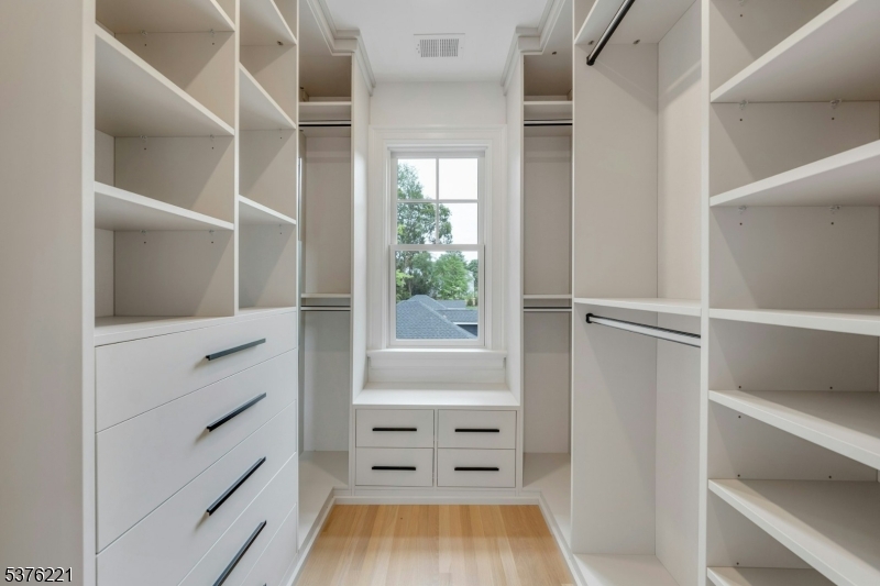 82 Watchung Avenue Montclair, NJ 07043 - Photo 28 of 48 a view of walk in closet with empty racks