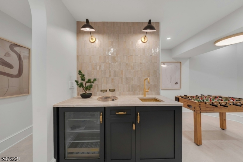 82 Watchung Avenue Montclair, NJ 07043 - Photo 41 of 48 a bathroom with a sink and a mirror