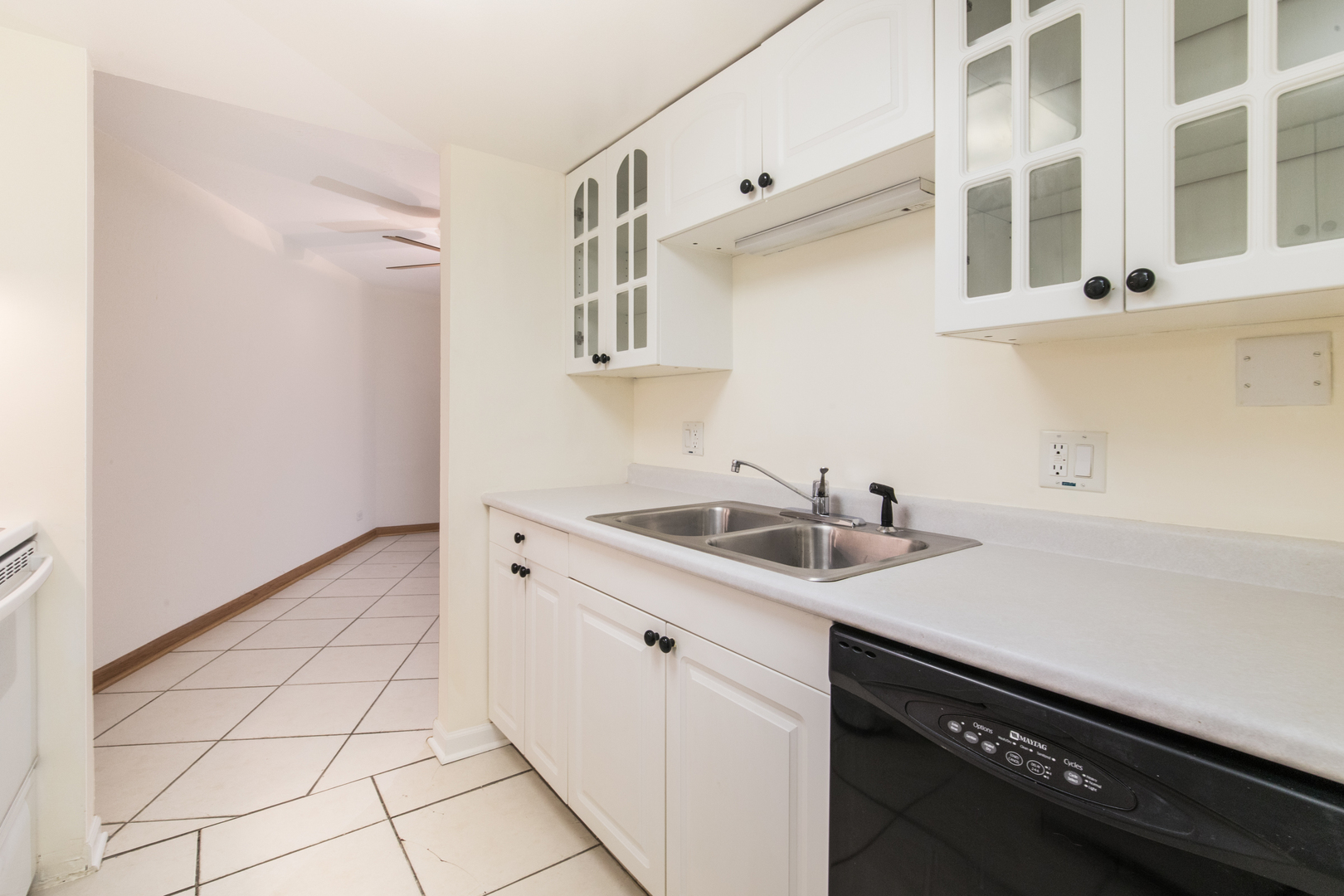 1 Renaissance Place, Unit 309 Palatine, IL 60067 - Photo 11 of 28 a kitchen with a sink and cabinets