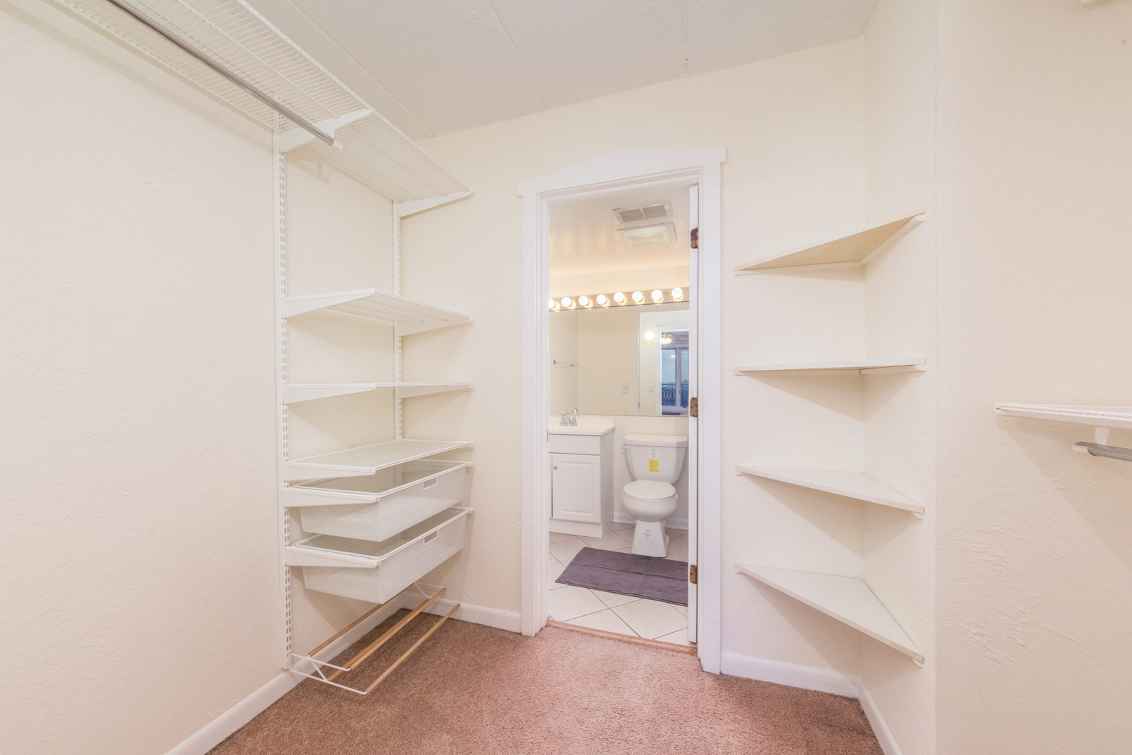 1 Renaissance Place, Unit 309 Palatine, IL 60067 - Photo 15 of 28 a room with a closet and a cabinet