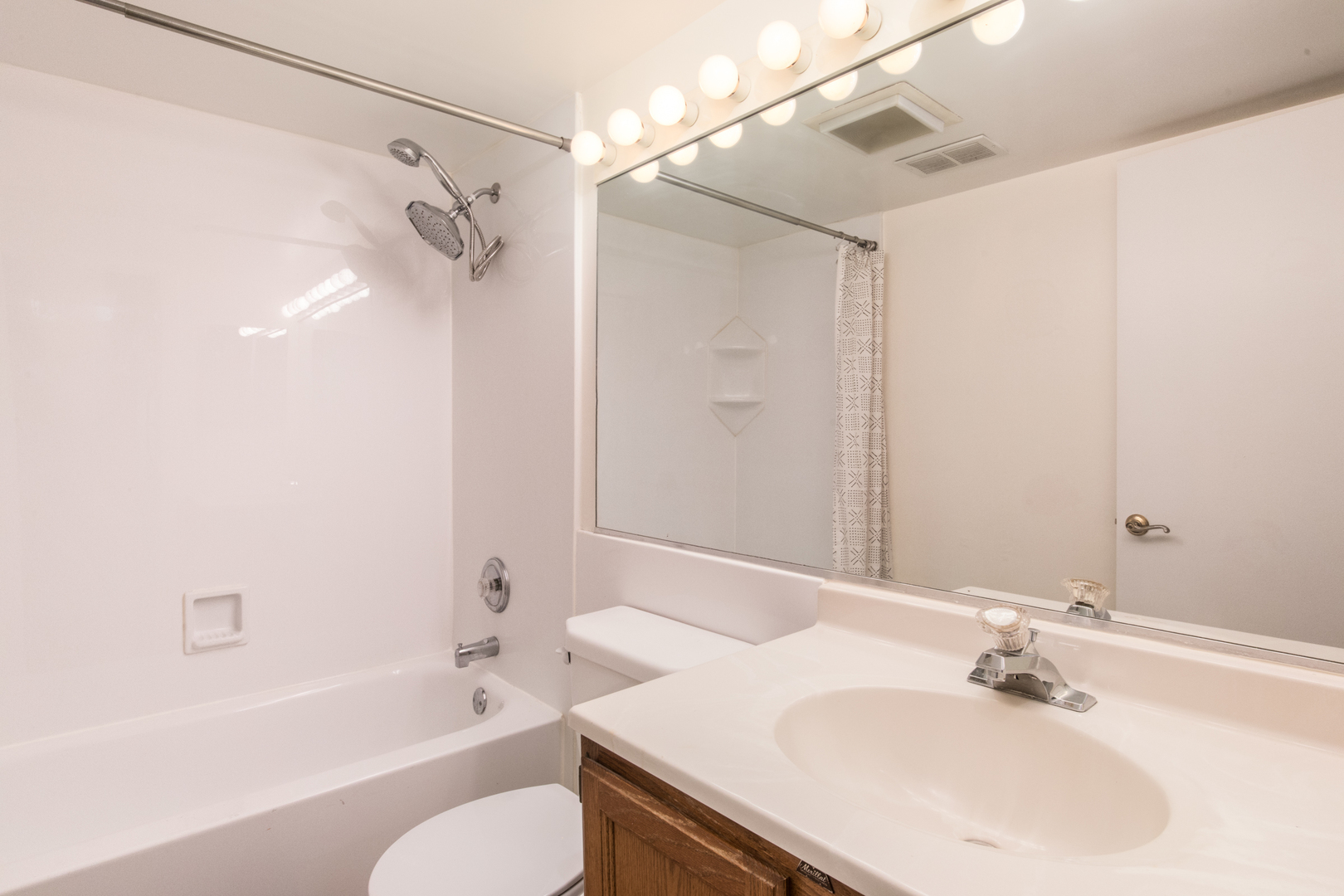 1 Renaissance Place, Unit 309 Palatine, IL 60067 - Photo 19 of 28 a bathroom with a sink a toilet and shower
