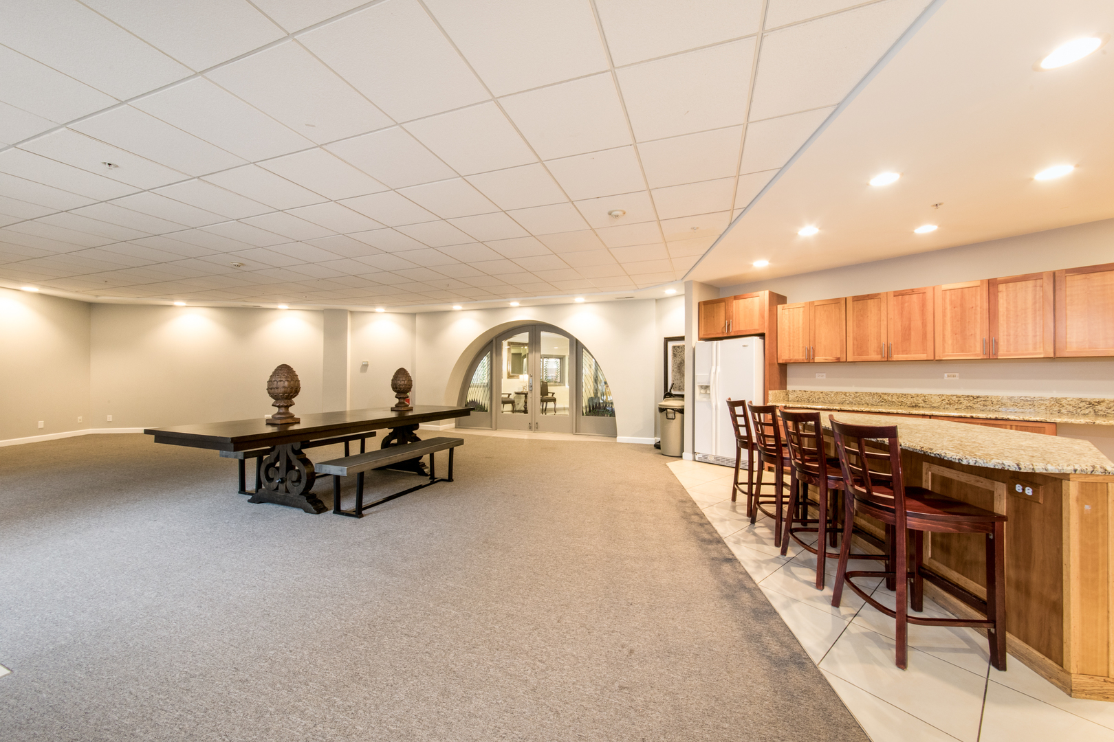 1 Renaissance Place, Unit 309 Palatine, IL 60067 - Photo 22 of 28 a living room with furniture a pool and a table