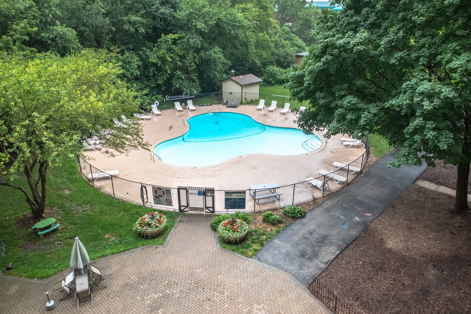 1 Renaissance Place, Unit 309 Palatine, IL 60067 - Photo 23 of 28 a view of a house with a yard and sitting area