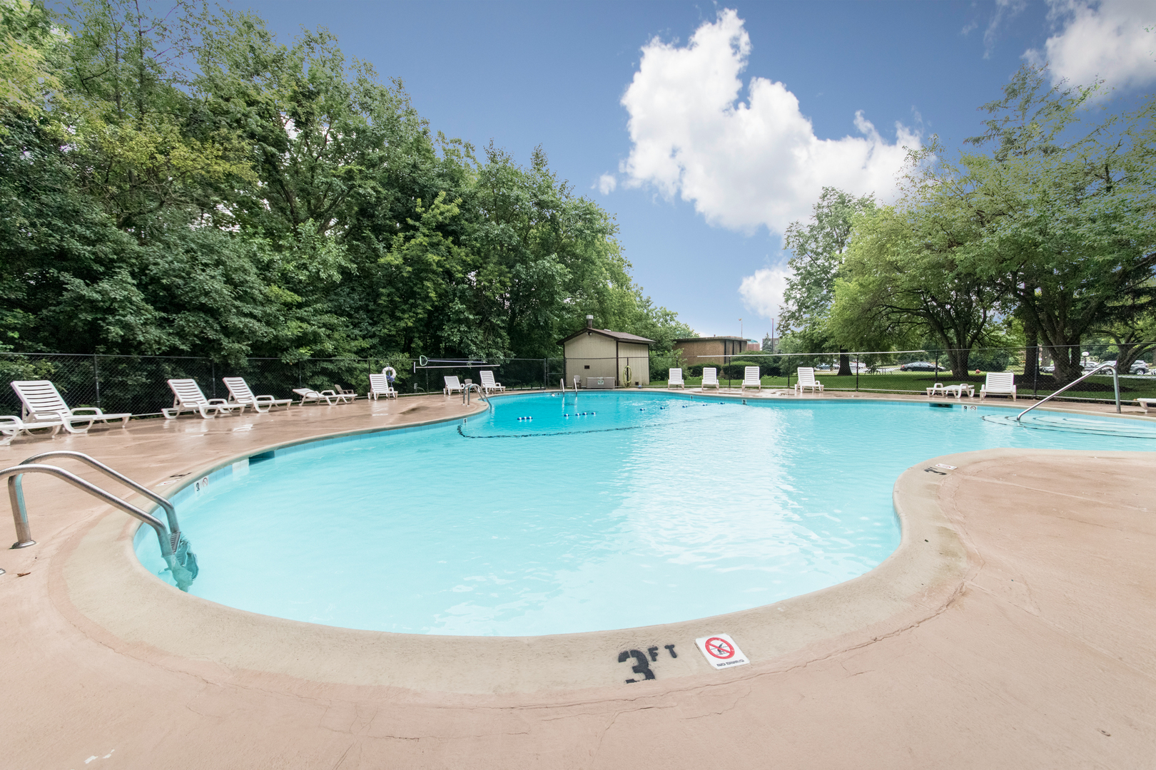 1 Renaissance Place, Unit 309 Palatine, IL 60067 - Photo 26 of 28 a view of a swimming pool in the backyard of a house