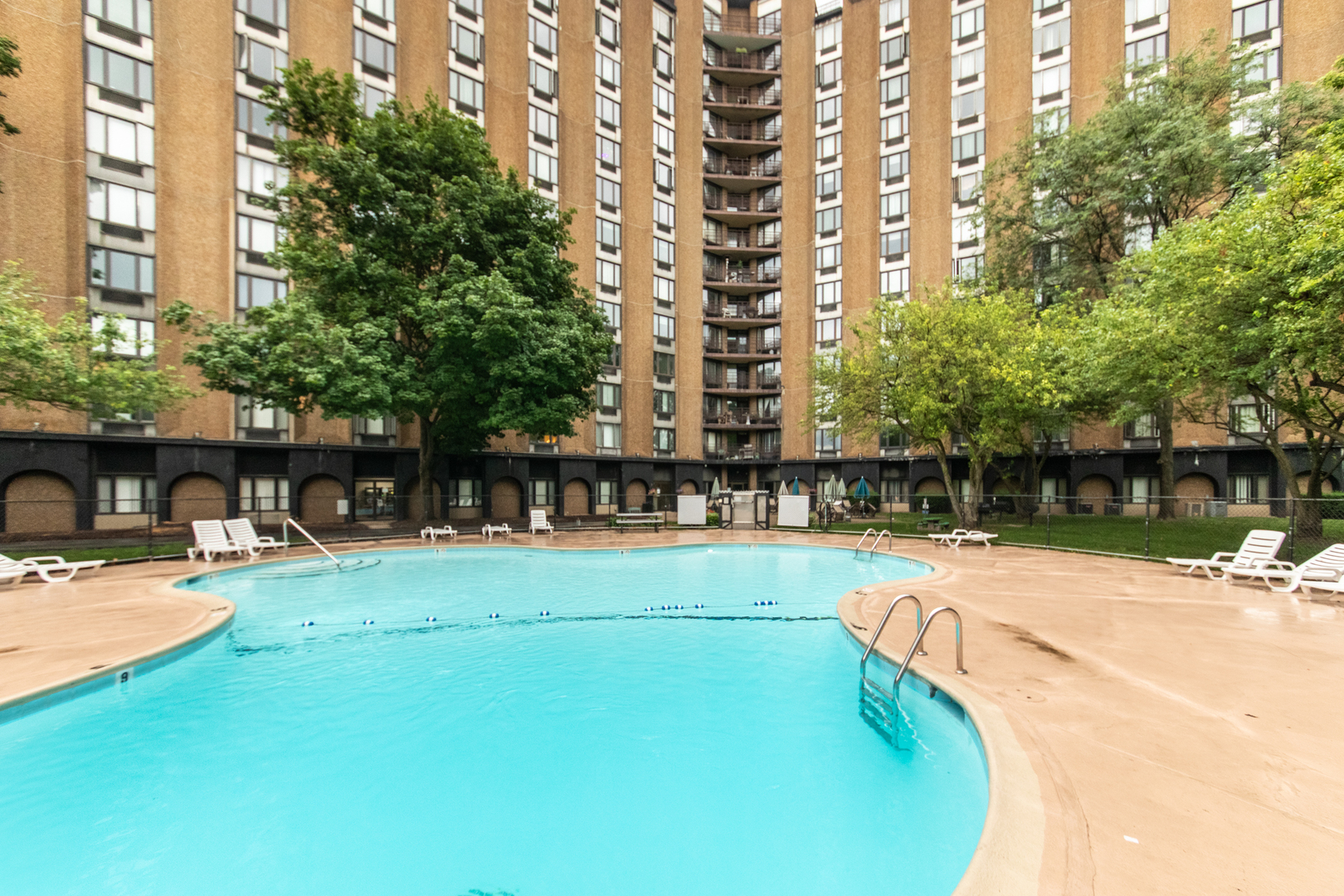 1 Renaissance Place, Unit 309 Palatine, IL 60067 - Photo 27 of 28 a view of swimming pool with outdoor seating and plants