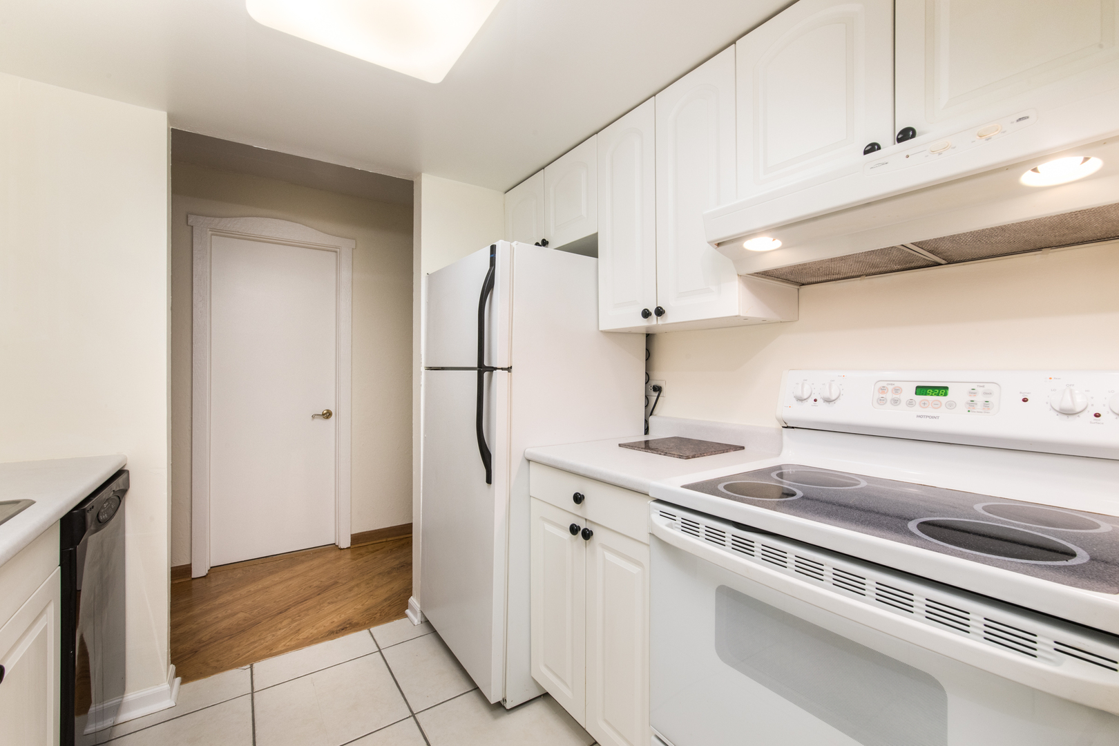 1 Renaissance Place, Unit 309 Palatine, IL 60067 - Photo 9 of 28 a kitchen with a stove and a refrigerator