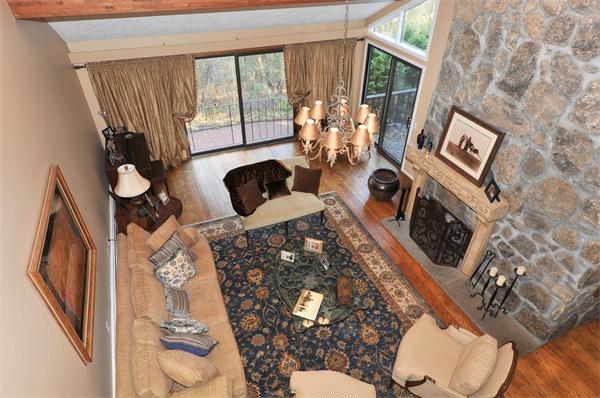 75 Lincoln Road Wayland, MA 01778 - Photo 16 of 27 a living room with furniture and a fireplace