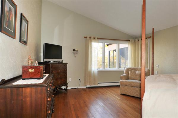 75 Lincoln Road Wayland, MA 01778 - Photo 18 of 27 a living room with furniture and a flat screen tv