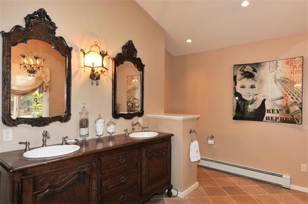 75 Lincoln Road Wayland, MA 01778 - Photo 20 of 27 a bathroom with a double vanity sink and a mirror