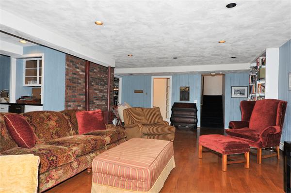 75 Lincoln Road Wayland, MA 01778 - Photo 23 of 27 a living room with furniture and wooden floor