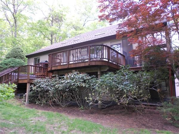 75 Lincoln Road Wayland, MA 01778 - Photo 3 of 27 a view of a house with a yard and wooden fence