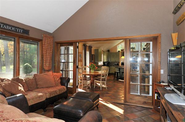 75 Lincoln Road Wayland, MA 01778 - Photo 10 of 27 a living room with furniture and a floor to ceiling window