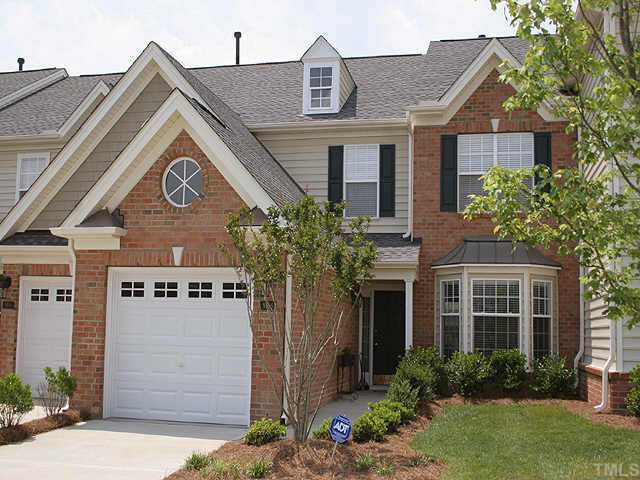 9506 Lost Key Court Raleigh, NC 27617 - Photo 1 of 1 a front view of a house with garden