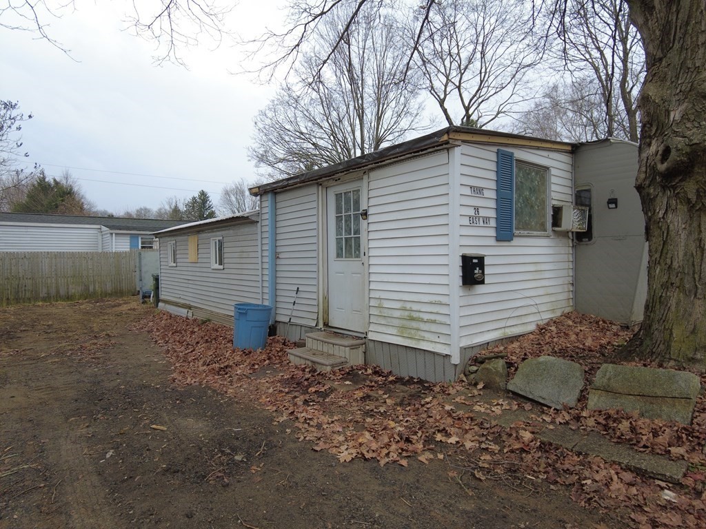 26 Easy Way Springfield, MA 01119 - Photo 2 of 13 a view of a small house with a yard