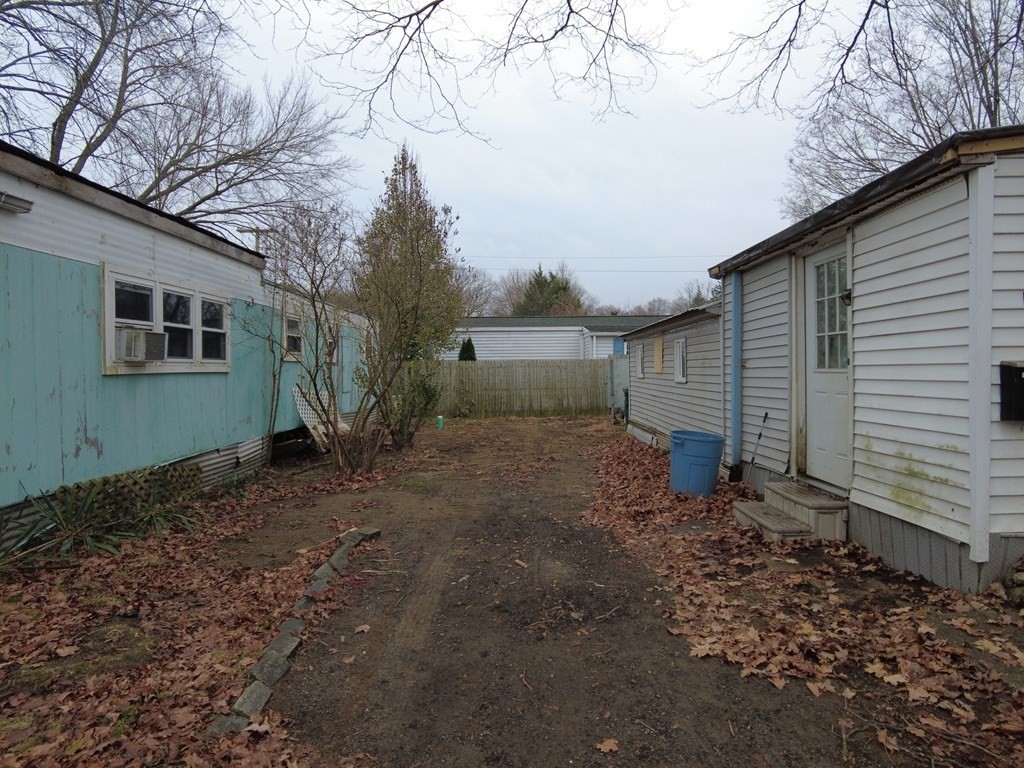 26 Easy Way Springfield, MA 01119 - Photo 3 of 13 a backyard of a house with lots of green space