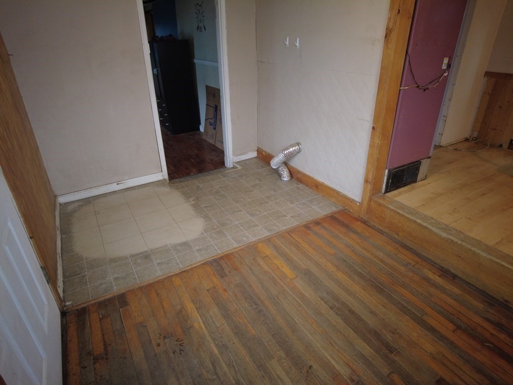 26 Easy Way Springfield, MA 01119 - Photo 4 of 13 wooden floor with staircase