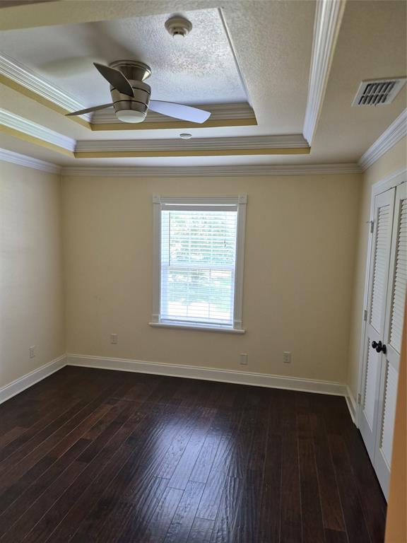 1497 West Loop 571 South Henderson, TX 75654 - Photo 14 of 25 an empty room with wooden floor and windows