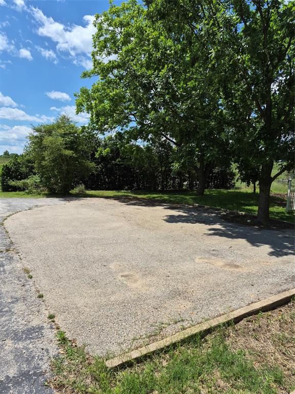 1497 West Loop 571 South Henderson, TX 75654 - Photo 22 of 25 a view of a backyard