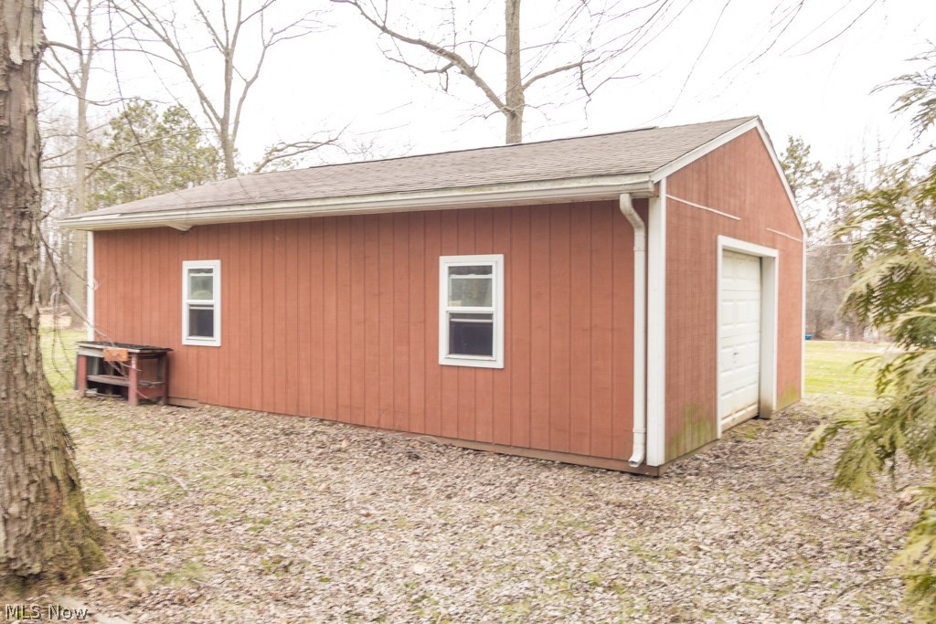 3152 Mayfair Road Akron, OH 44312 - Photo 23 of 31 22' x 28' barn with double-hung windows and electric. Great place for a workshop, man cave or extra storage. Unheated.