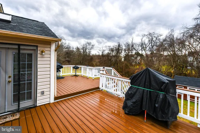a view of balcony with furniture