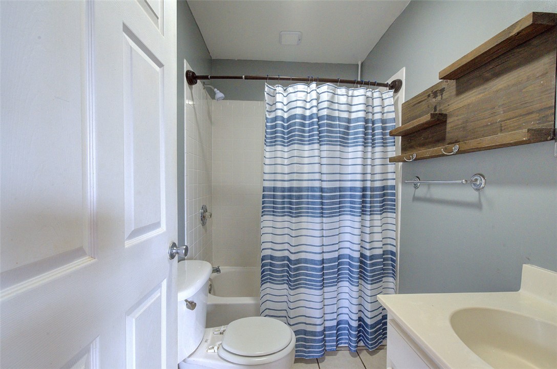 325 Rock Quarry Road Travelers Rest, SC 29690 - Photo 22 of 37 This functional bathroom features a shower-tub combination and a practical vanity.