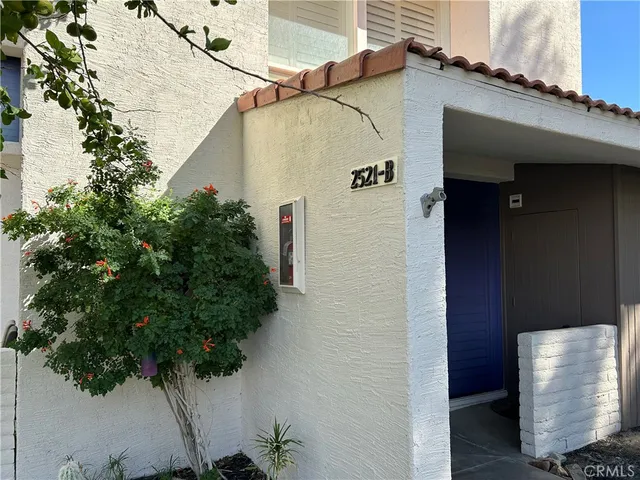 a house view with a outdoor space