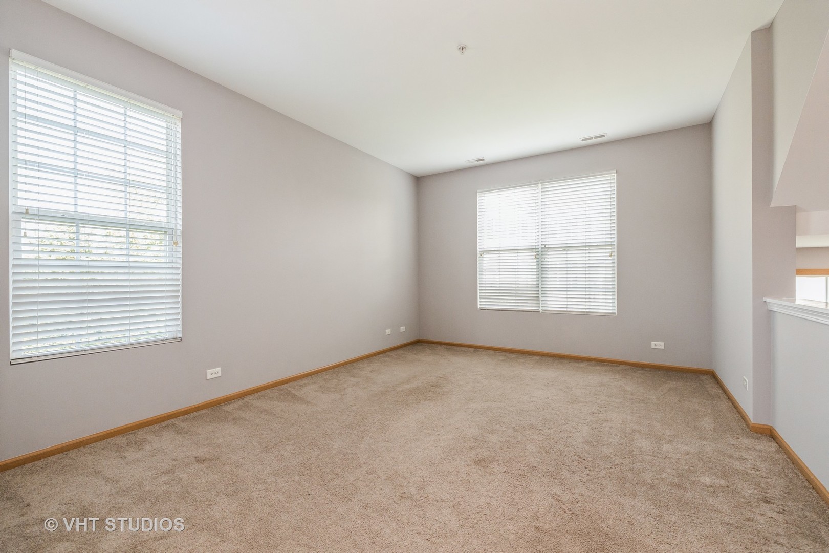 3781 Bailey Road, Unit 404 Yorkville, IL 60560 - Photo 3 of 21 an empty room with windows