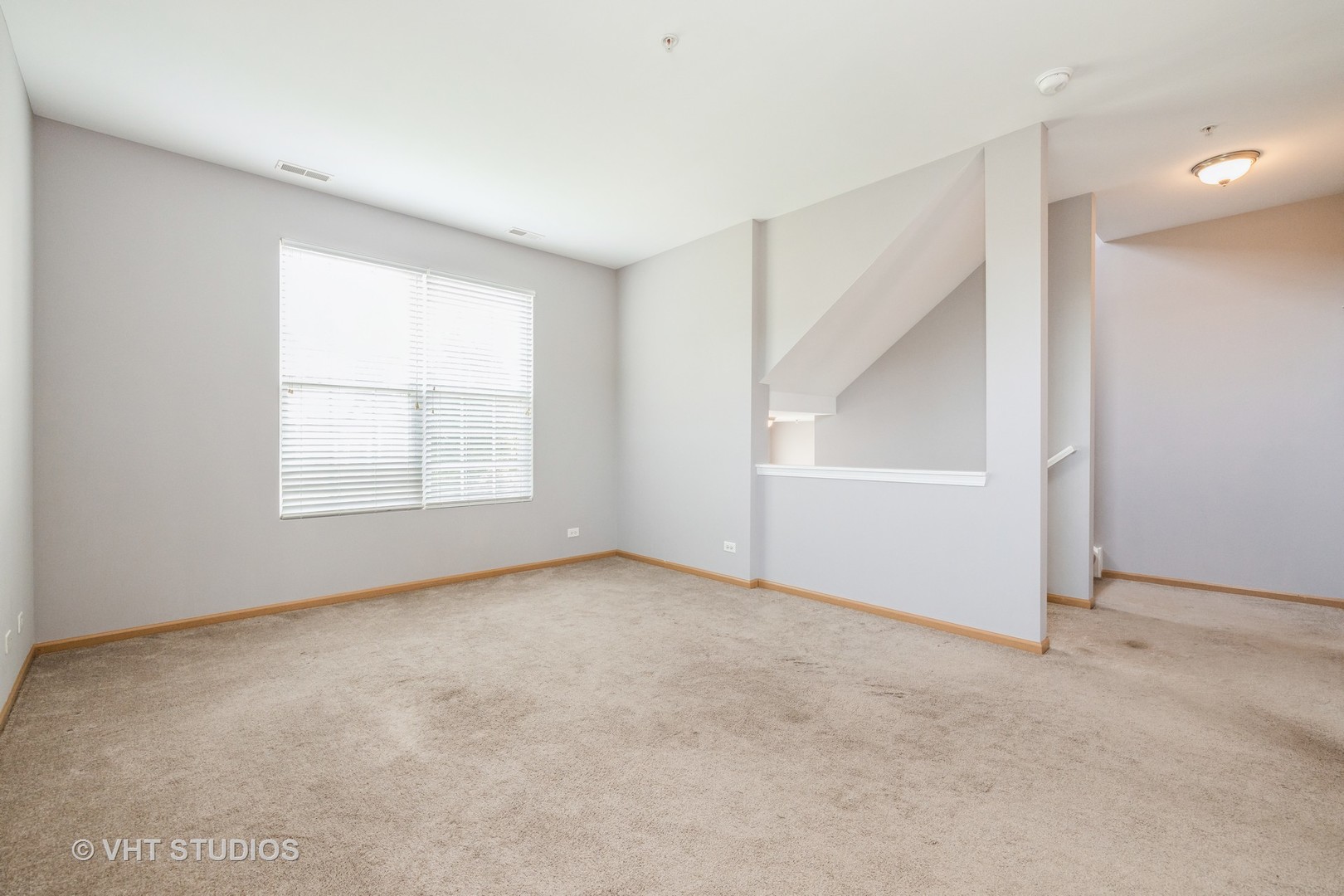 3781 Bailey Road, Unit 404 Yorkville, IL 60560 - Photo 4 of 21 an empty room with windows and closet
