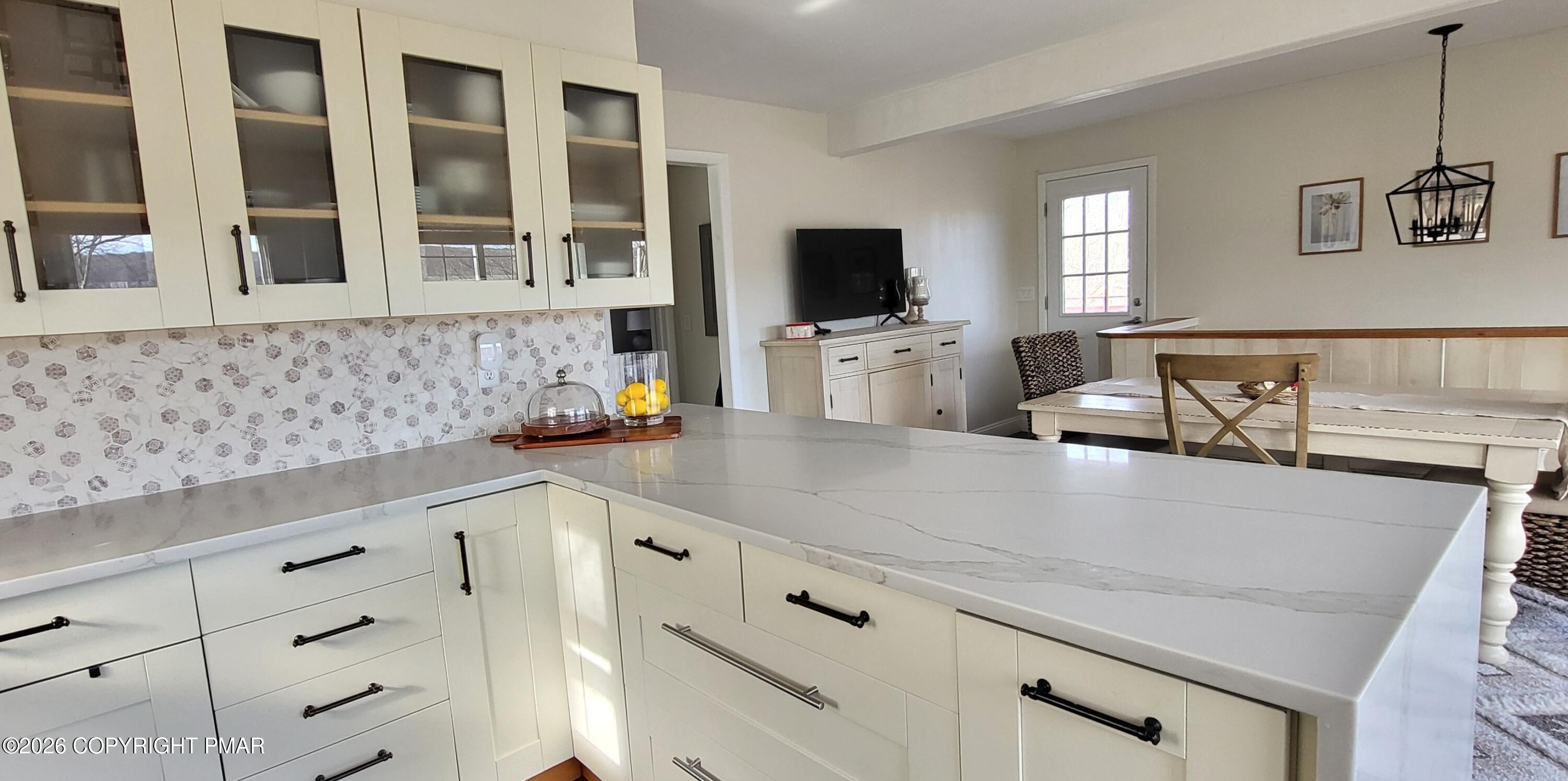 1093 Porter Drive Bushkill, PA 18324 - Photo 12 of 66 a kitchen with cabinets appliances and a sink