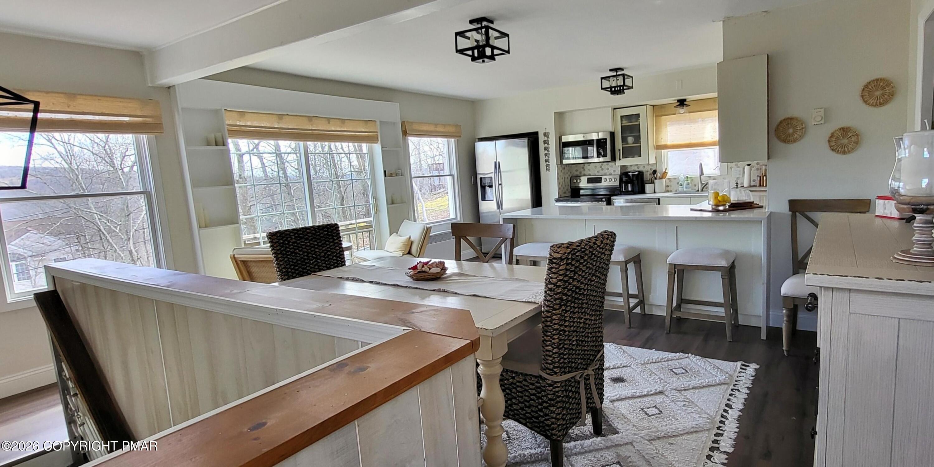 1093 Porter Drive Bushkill, PA 18324 - Photo 2 of 66 a view of a dining room with furniture window and outside view