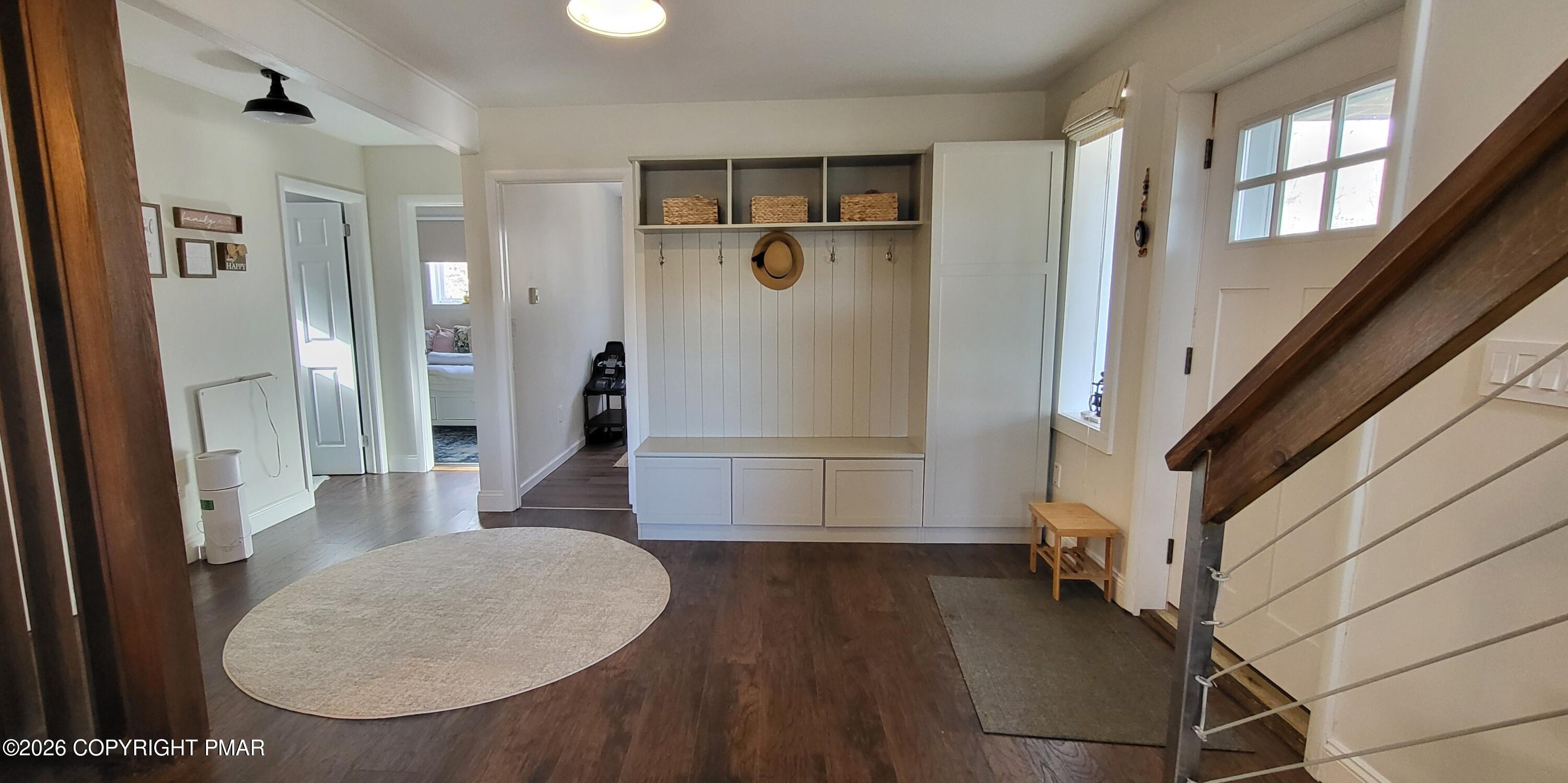 1093 Porter Drive Bushkill, PA 18324 - Photo 22 of 66 a view of a hallway with wooden floor and staircase