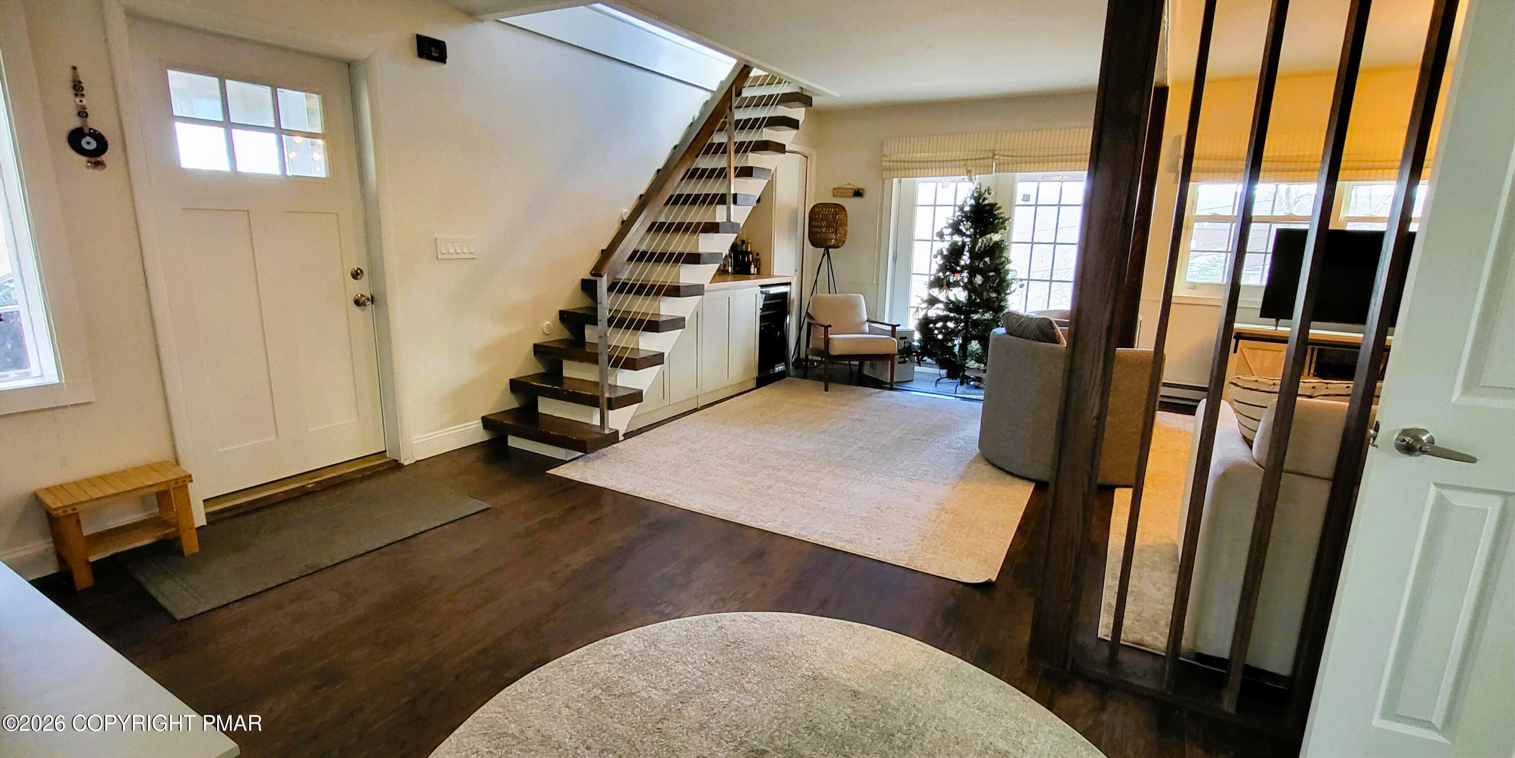 1093 Porter Drive Bushkill, PA 18324 - Photo 31 of 66 a view of a livingroom with furniture and staircase