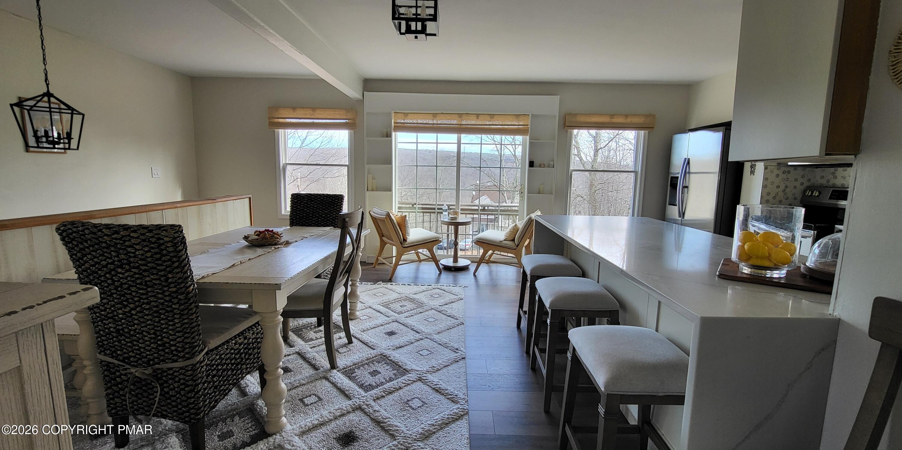 1093 Porter Drive Bushkill, PA 18324 - Photo 4 of 66 a view of a dining room with furniture window and outside view