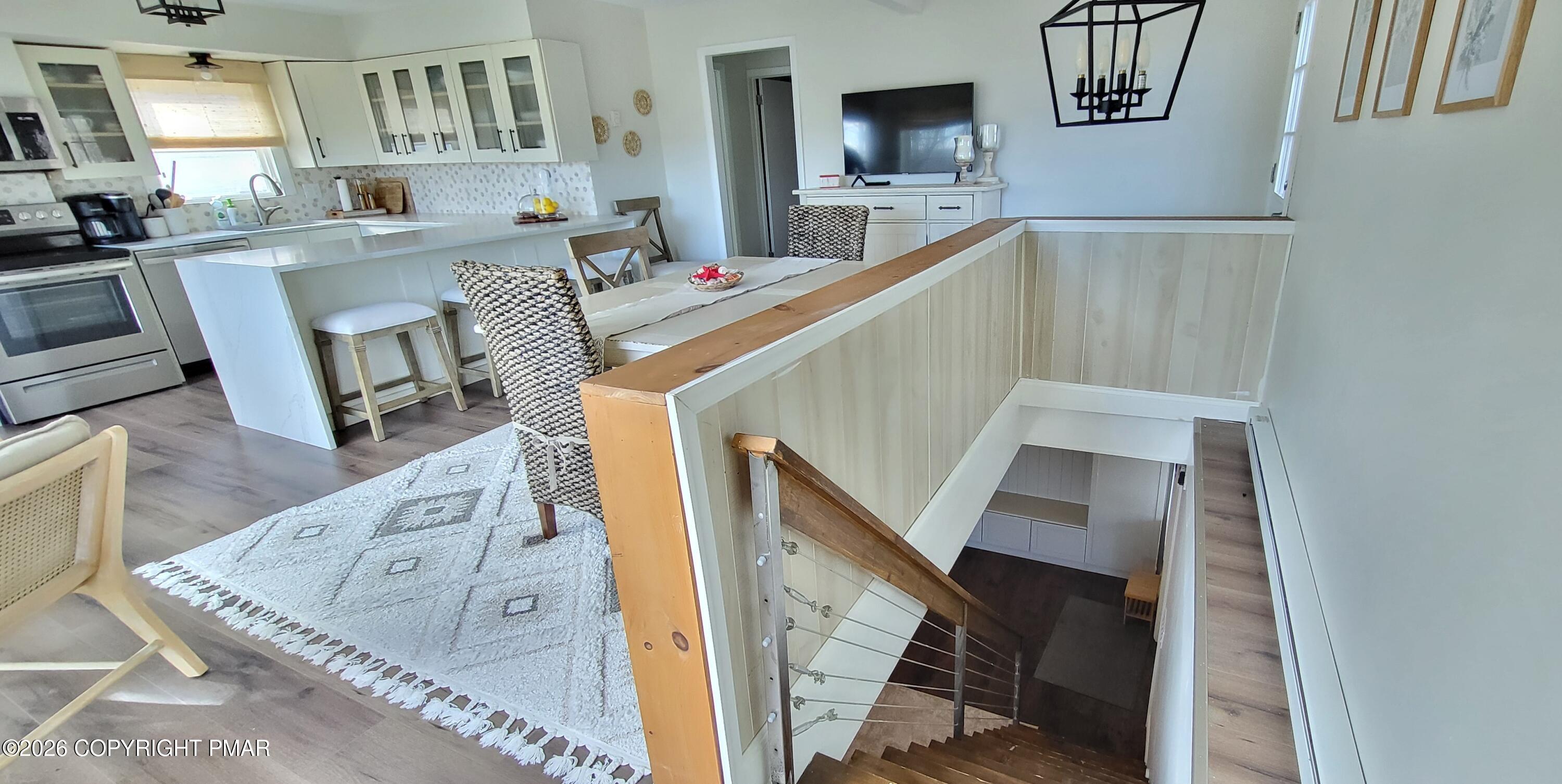 1093 Porter Drive Bushkill, PA 18324 - Photo 6 of 66 a living room with furniture and a wooden floor
