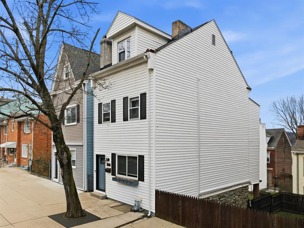 Great 3 story home on a quiet street but steps from Butler