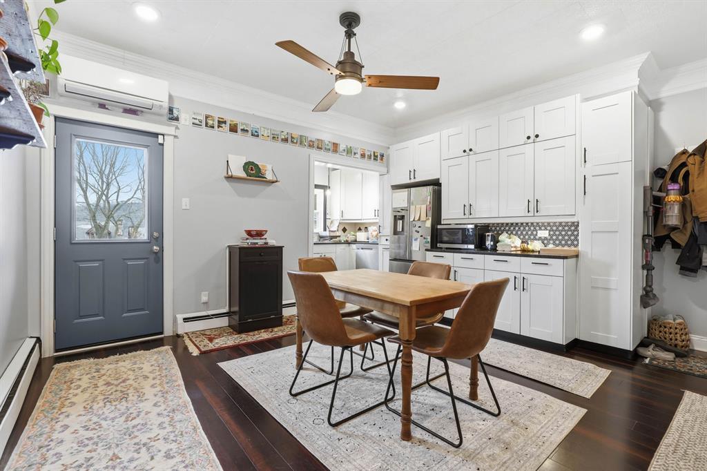 5133 Holmes Street Pittsburgh, PA 15201 - Photo 21 of 45 The door to the balcony is off of the dining area so you can enjoy a gently breeze even when dining indoors