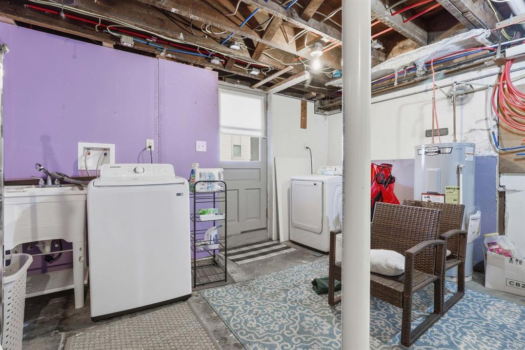 5133 Holmes Street Pittsburgh, PA 15201 - Photo 39 of 45 The basement has been entirely replumbed and is a pleasant area for laundry. It also offers storage and access to the porch, patio and backyard.